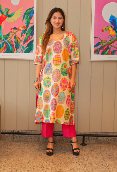 Introducing Peatchy Cuts - the epitome of effortless style. This baggy sleeve tunic kurti set from designer wear brand Destiny by Anjali is made with a luxuriously comfortable cotton linen fabric and is fully lined. Perfect for the summer season, this set features the trendy baggy sleeves and bold hot pink and blossom colors. Experience the luxury and exclusivity with Peatchy Cuts.