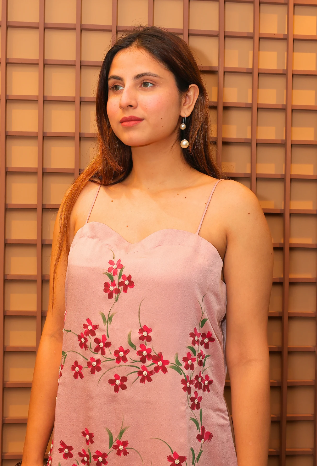 Experience the beauty of nature with Floral Desire. This hand painted and hand embroidered suit features a stunning floral design on imported armani satin fabric. With a delicate noodle strap neckline, this suit is a true masterpiece from designer brand Destiny by Anjali. Elevate your style and embrace the art of nature.