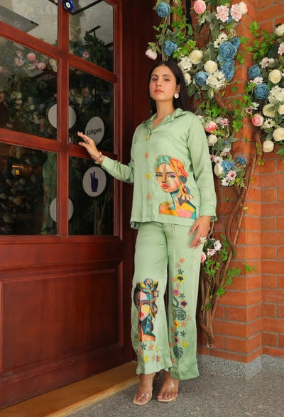 the Imperial Facet coord set from Destiny by Anjali. This stunning designer western wear features a rich pista green hue, crafted from luxurious bombarg satin. Adorned with intricate hand-embroidered floral beading on the shoulder and unique faces digital print patches with embroidered highlights, this fully lined set offers sophistication with a modern twist. Perfect for all-weather and occasion wear, the trending coord set blends tradition and style effortlessly, making it ideal for every event.