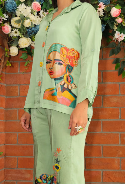 the Imperial Facet coord set from Destiny by Anjali. This stunning designer western wear features a rich pista green hue, crafted from luxurious bombarg satin. Adorned with intricate hand-embroidered floral beading on the shoulder and unique faces digital print patches with embroidered highlights, this fully lined set offers sophistication with a modern twist. Perfect for all-weather and occasion wear, the trending coord set blends tradition and style effortlessly, making it ideal for every event.