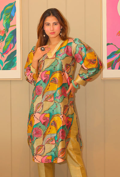 Indulge in the luxurious Ishq-e-rang Camisole Kurti Set from Destiny by Anjali. Made with passion and crafted from a smooth and breathable cotton silk fabric, this set features a perfect blend of elegance and comfort. Its vibrant colors resemble the beautiful shades of love, making it the perfect choice for a stylish and chic summer look. The fabric has a self shiny look which embraces in natural lighting.