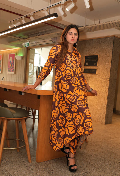 Elevate your summer wardrobe with the Saffron Fauna - Tunic Kurti Set. This exquisite tunic style set is made with double georgette fabric, perfect for the warm weather. With its exquisite floral print and coffee and mustard color combination, it exudes elegance and never goes out of style. From the luxurious brand Destiny by Anjali.