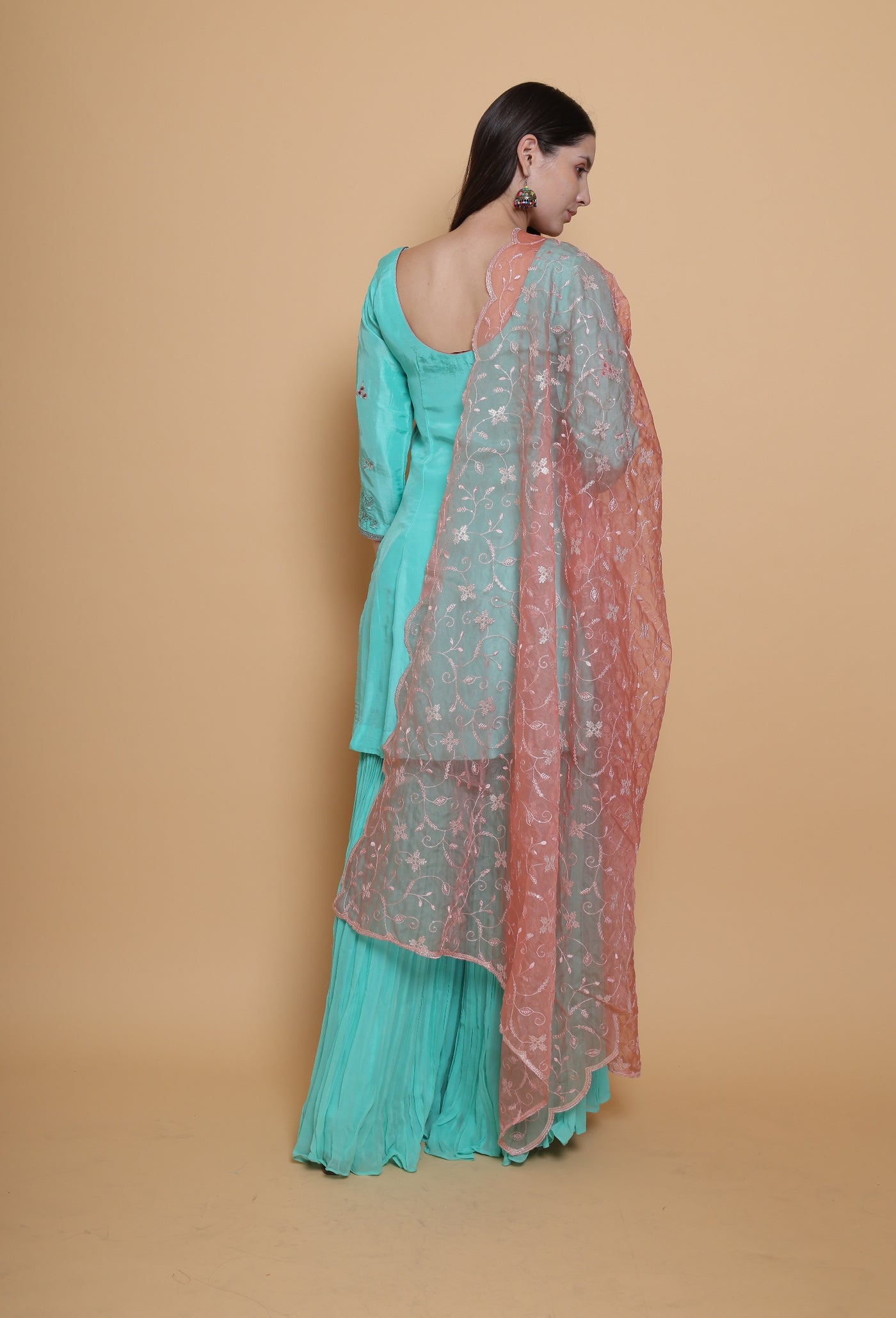 Destiny by Anjali: Tropical Blue Sharara Suit. Embroidered upada silk with Embroidered Pink Net Dupatta. Sharara fashion, designer clothing, unique color.