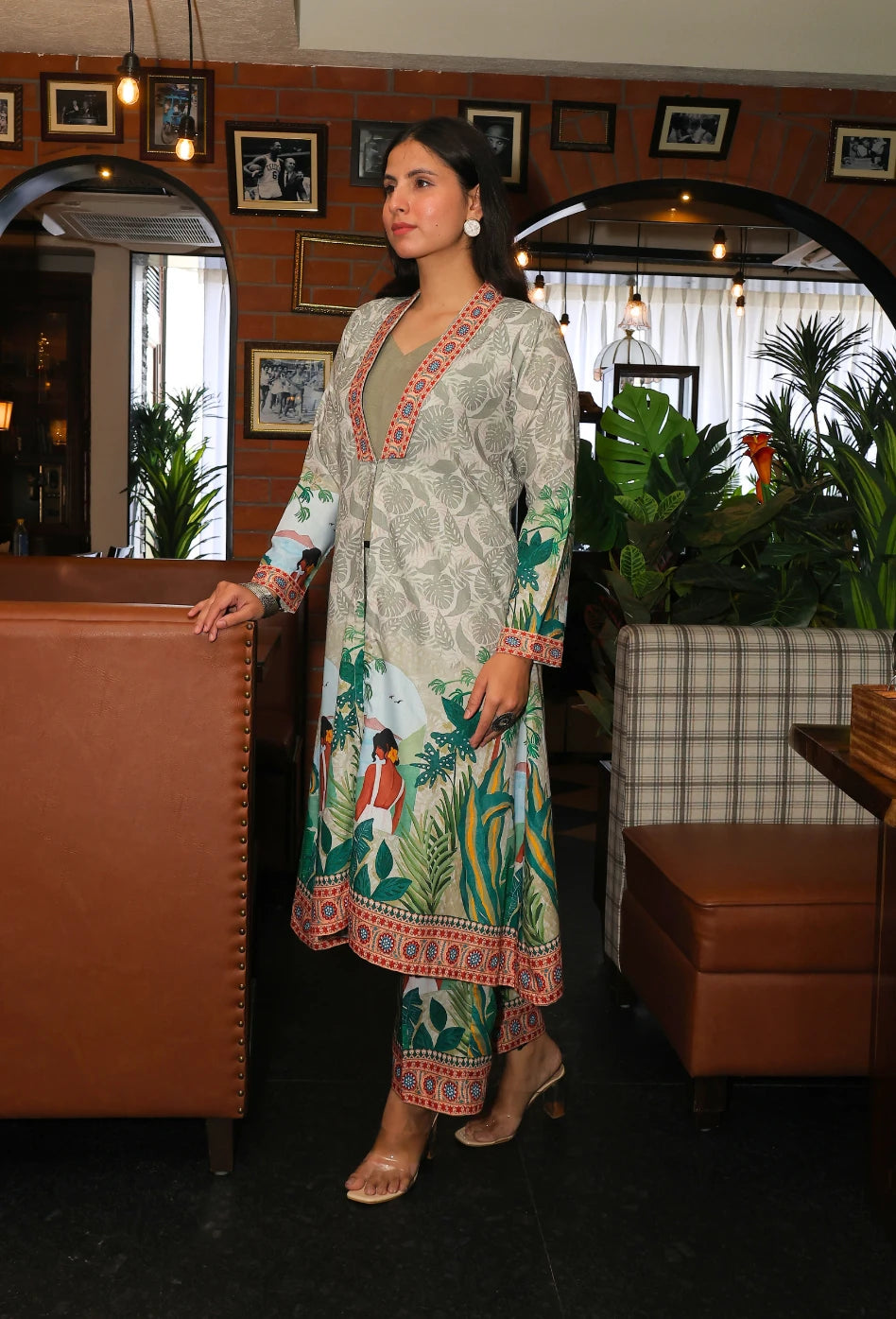 the Savannah Serenity Jacket Coord Set from Destiny by Anjali. This designer jacket-style coord set, in beige and green, features a striking digital print inspired by tribal and beach women. Crafted from premium cotton linen fabric, it’s perfect for all-weather wear and ensures comfort and style for every occasion. Whether it's a casual day out or a beach event, this trending Western wear coord set offers versatility and sophistication. The jacket-style design adds a chic touch, making it the perfect choice