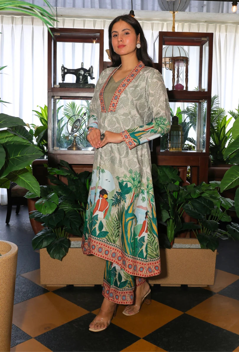 the Savannah Serenity Jacket Coord Set from Destiny by Anjali. This designer jacket-style coord set, in beige and green, features a striking digital print inspired by tribal and beach women. Crafted from premium cotton linen fabric, it’s perfect for all-weather wear and ensures comfort and style for every occasion. Whether it's a casual day out or a beach event, this trending Western wear coord set offers versatility and sophistication. The jacket-style design adds a chic touch, making it the perfect choice